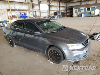 Czwarte zdjęcie samochodu z boku: 2015 VOLKSWAGEN JETTA BASE VIN:3VW1K7AJ2FM427584 - miniatura