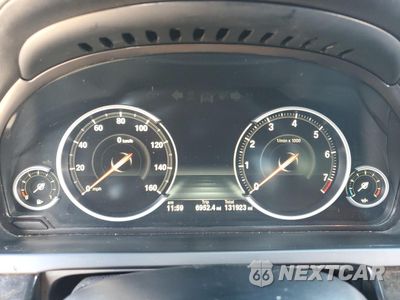Zdjęcie 9 z 13 samochodu: 2014 BMW 750 I VIN:WBAYA8C55ED825308 - miniatura