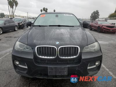 Piąte zdjęcie samochodu w środku: 2014 BMW X6 XDRIVE35I VIN:5UXFG2C58E0K41237 - miniatura