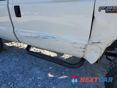 Zdjęcie 9 z 11 samochodu: 1999 FORD F250 SUPER DUTY VIN:1FTNF21L8XEA44771 - miniatura