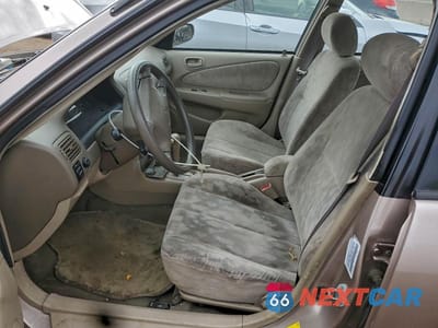 Zdjęcie 7 z 12 samochodu: 1998 TOYOTA COROLLA VIN:1NXBR18E4WZ040602 - miniatura