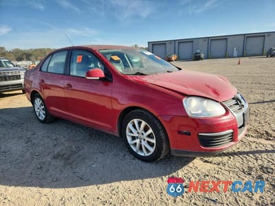 Czwarte zdjęcie samochodu z boku: 2010 VOLKSWAGEN JETTA SE VIN:3VWRZ7AJ9AM161357 - miniatura
