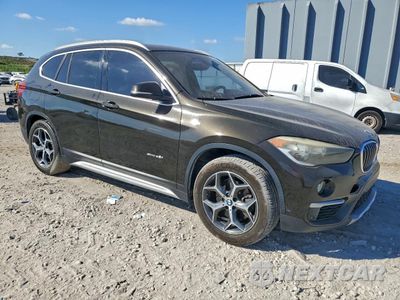 Czwarte zdjęcie samochodu z boku: 2017 BMW X1 SDRIVE28I VIN:WBXHU7C33H5H32861 - miniatura