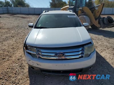 Piąte zdjęcie samochodu w środku: 2008 FORD TAURUS X SEL VIN:1FMDK05W08GA32051 - miniatura