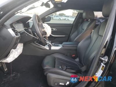 Zdjęcie 7 z 12 samochodu: 2022 BMW 330I VIN:3MW5R1J05N8C31504 - miniatura