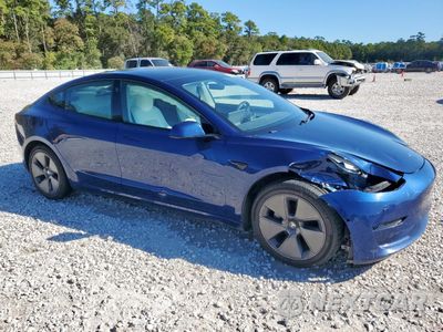 Czwarte zdjęcie samochodu z boku: 2021 TESLA MODEL 3 VIN:5YJ3E1EB7MF059696 - miniatura