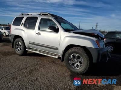 Czwarte zdjęcie samochodu z boku: 2015 NISSAN XTERRA X VIN:5N1AN0NW8FN658174 - miniatura