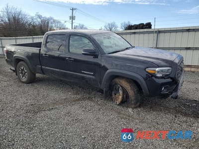 Czwarte zdjęcie samochodu z boku: 2021 TOYOTA TACOMA DOUBLE CAB VIN:3TMDZ5BN7MM116022 - miniatura