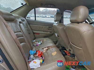 Zdjęcie 10 z 13 samochodu: 2001 BUICK CENTURY LIMITED VIN:2G4WY55J711108490 - miniatura