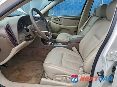 Zdjęcie 7 z 12 samochodu: 2001 OLDSMOBILE AURORA VIN:1G3GR64H714106415 - miniatura