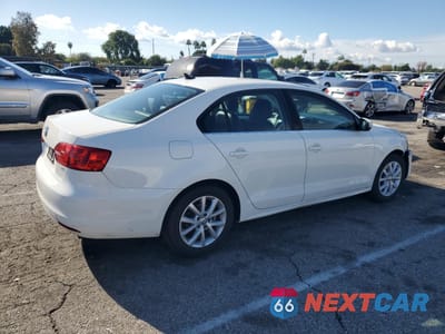 Trzecie zdjęcie samochodu z tyłu: 2014 VOLKSWAGEN JETTA SE VIN:3VWD07AJ4EM237674 - miniatura