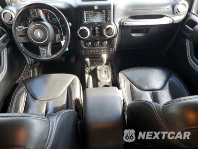 Zdjęcie 8 z 14 samochodu: 2014 JEEP WRANGLER UNLIMITED SAHARA VIN:1C4HJWEG5EL210785 - miniatura