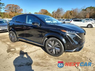Czwarte zdjęcie samochodu z boku: 2023 NISSAN ARIYA PLATINUM + VIN:JN1DF0CD0PM708902 - miniatura