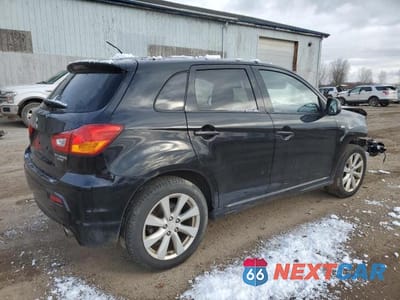 Trzecie zdjęcie samochodu z tyłu: 2012 MITSUBISHI OUTLANDER SPORT SE VIN:JA4AR4AU7CZ003572 - miniatura