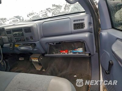 Piąte zdjęcie samochodu w środku: 1999 FORD F250 SUPER DUTY VIN:1FTNF21L8XEA44771 - miniatura