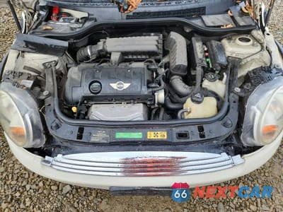 Zdjęcie 11 z 11 samochodu: 2010 MINI COOPER VIN:WMWMF3C52ATU77440 - miniatura