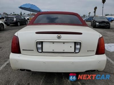 Zdjęcie 6 z 14 samochodu: 2000 CADILLAC DEVILLE DTS VIN:1G6KF5795YU224641 - miniatura