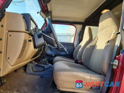 Zdjęcie 7 z 14 samochodu: 1999 JEEP WRANGLER / TJ SE VIN:1J4FY29P9XP467458 - miniatura