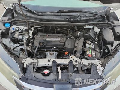 Zdjęcie 12 z 15 samochodu: 2015 HONDA CR-V EXL VIN:5J6RM3H71FL024047 - miniatura