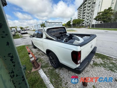Trzecie zdjęcie samochodu z tyłu: 2019 HONDA RIDGELINE SPORT VIN:5FPYK2F12KB001221 - miniatura