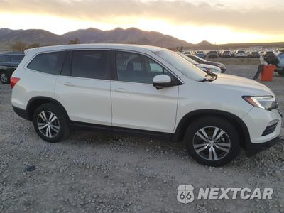 Czwarte zdjęcie samochodu z boku: 2018 HONDA PILOT EX VIN:5FNYF6H31JB062951 - miniatura