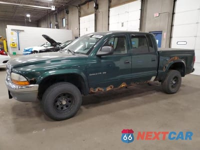 2002 DODGE DAKOTA QUAD SLT 1B7HG48N52S661939 - główne zdjęcie licytacji z USA - miniatura