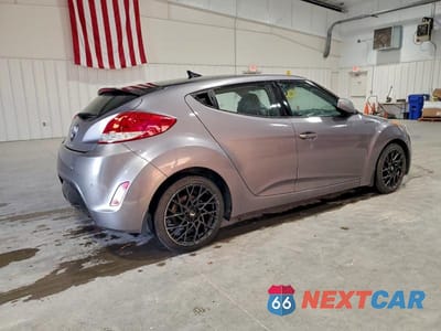 Trzecie zdjęcie samochodu z tyłu: 2013 HYUNDAI VELOSTER VIN:KMHTC6AD0DU093198 - miniatura
