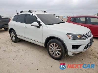Czwarte zdjęcie samochodu z boku: 2016 VOLKSWAGEN TOUAREG SPORT VIN:WVGEF9BP9GD000516 - miniatura