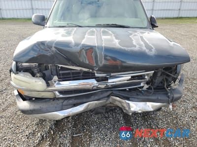 Zdjęcie 12 z 15 samochodu: 2004 CHEVROLET SUBURBAN C1500 VIN:1GNEC16T74J131499 - miniatura