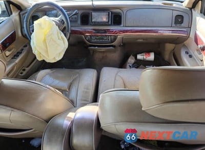 Zdjęcie 8 z 13 samochodu: 2001 MERCURY GRAND MARQUIS LS VIN:2MEFM75W31X643139 - miniatura