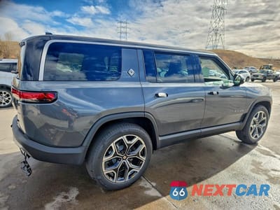 Trzecie zdjęcie samochodu z tyłu: 2025 RIVIAN R1S ADVENTURE VIN:7PDSGBBA9SN066275 - miniatura