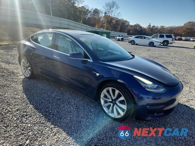 Czwarte zdjęcie samochodu z boku: 2019 TESLA MODEL 3 VIN:5YJ3E1EB8KF450918 - miniatura