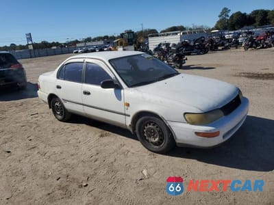 Czwarte zdjęcie samochodu z boku: 1994 TOYOTA COROLLA DX VIN:JT2AE09B8R0070667 - miniatura