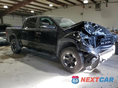 Czwarte zdjęcie samochodu z boku: 2021 RAM 1500 REBEL VIN:1C6SRFLT1MN761286 - miniatura
