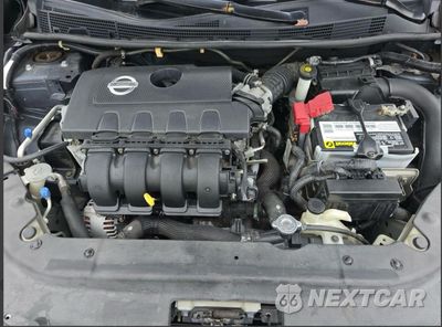 Zdjęcie 7 z 10 samochodu: 2014 NISSAN SENTRA S VIN:3N1AB7AP1EY209203 - miniatura