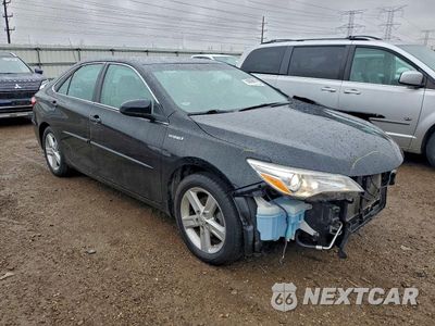 Czwarte zdjęcie samochodu z boku: 2015 TOYOTA CAMRY HYBRID VIN:4T1BD1FK8FU151743 - miniatura