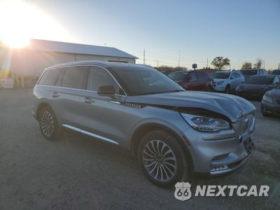 Czwarte zdjęcie samochodu z boku: 2023 LINCOLN AVIATOR RESERVE VIN:5LM5J7XC4PGL20444 - miniatura
