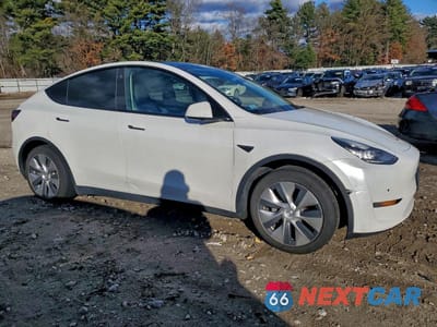 Czwarte zdjęcie samochodu z boku: 2022 TESLA MODEL Y VIN:7SAYGAEE7NF383438 - miniatura