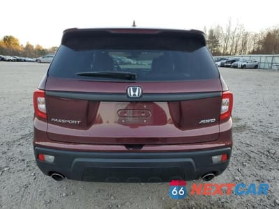 Zdjęcie 6 z 12 samochodu: 2021 HONDA PASSPORT EXL VIN:5FNYF8H59MB006564 - miniatura