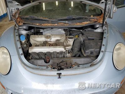 Zdjęcie 11 z 12 samochodu: 2010 VOLKSWAGEN NEW BEETLE VIN:3VWPG3AG7AM007160 - miniatura