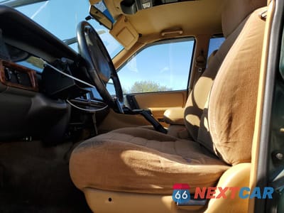 Zdjęcie 7 z 16 samochodu: 1997 JEEP GRAND CHEROKEE LAREDO VIN:1J4FX58S0VC715613 - miniatura