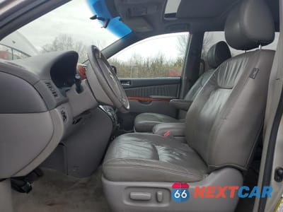 Zdjęcie 7 z 13 samochodu: 2010 TOYOTA SIENNA XLE VIN:5TDYK4CC3AS316002 - miniatura