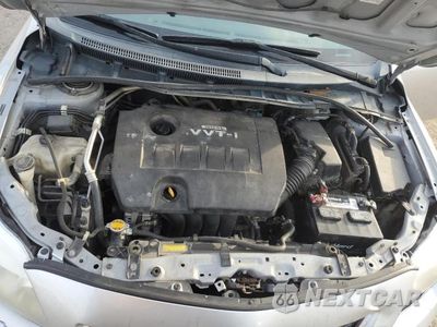 Zdjęcie 11 z 12 samochodu: 2010 TOYOTA COROLLA VIN:2T1BU4EE2AC320212 - miniatura