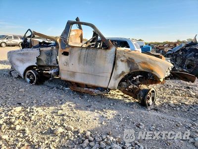 Czwarte zdjęcie samochodu z boku: 2001 FORD F150 VIN:1FTZF07271KA59338 - miniatura