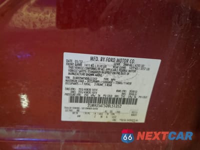 Zdjęcie 14 z 14 samochodu: 2013 LINCOLN MKT VIN:2LMHJ5AT5DBL51352 - miniatura