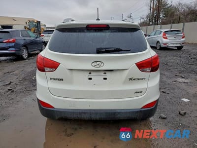 Zdjęcie 6 z 13 samochodu: 2010 HYUNDAI TUCSON GLS VIN:KM8JUCAC6AU080462 - miniatura