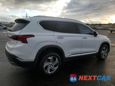 Trzecie zdjęcie samochodu z tyłu: 2023 HYUNDAI SANTA FE SEL PREMIUM VIN:5NMS3DAJ8PH619535 - miniatura