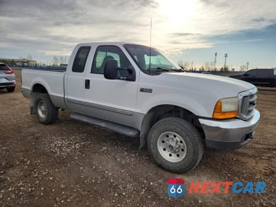 Czwarte zdjęcie samochodu z boku: 1999 FORD F250 SUPER DUTY VIN:1FTNX21S3XEE33516 - miniatura