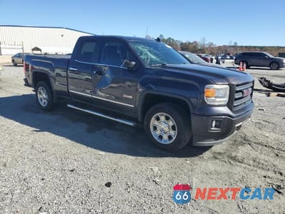 Czwarte zdjęcie samochodu z boku: 2015 GMC SIERRA K1500 SLT VIN:1GTV2VEC7FZ331727 - miniatura