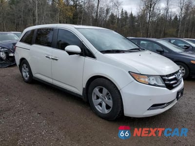 Czwarte zdjęcie samochodu z boku: 2017 HONDA ODYSSEY EXL VIN:5FNRL5H68HB502529 - miniatura